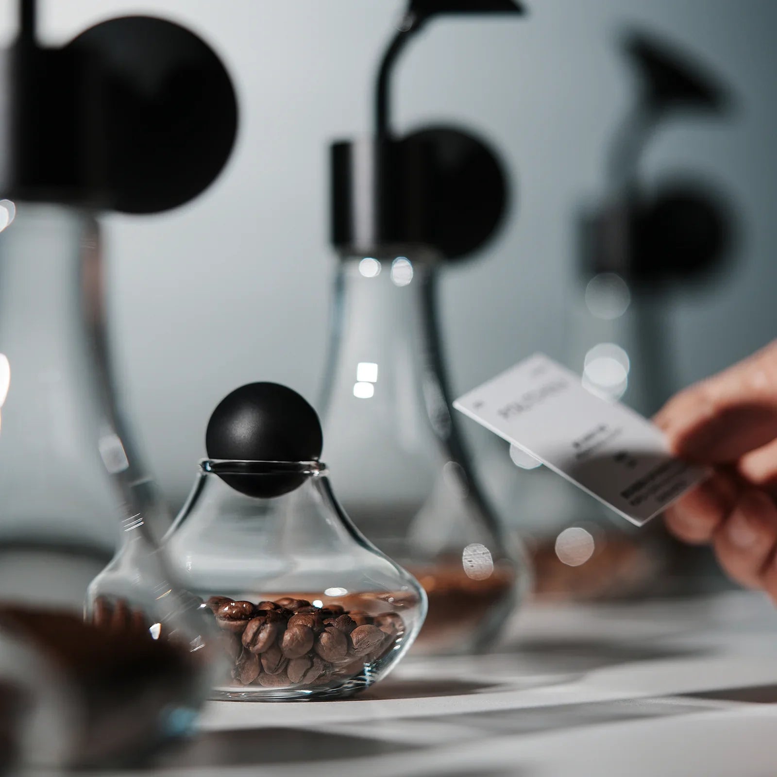 glass jar with an airtight ball lid with coffee beans inside for storage