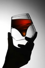 Double walled espresso cup front holding up